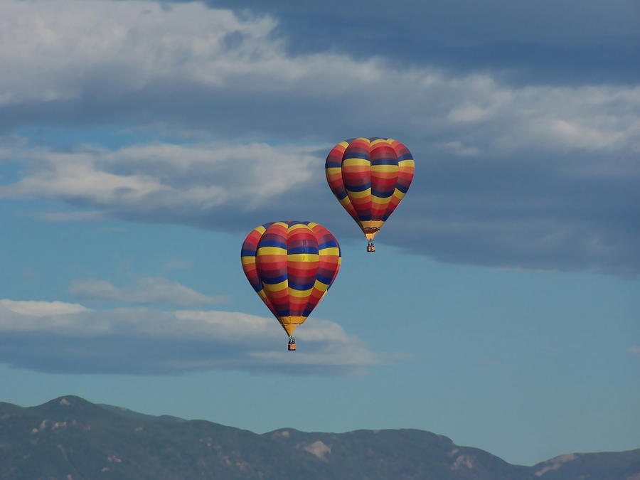 Balloons over the Rockies Photograph by Ernest Echols