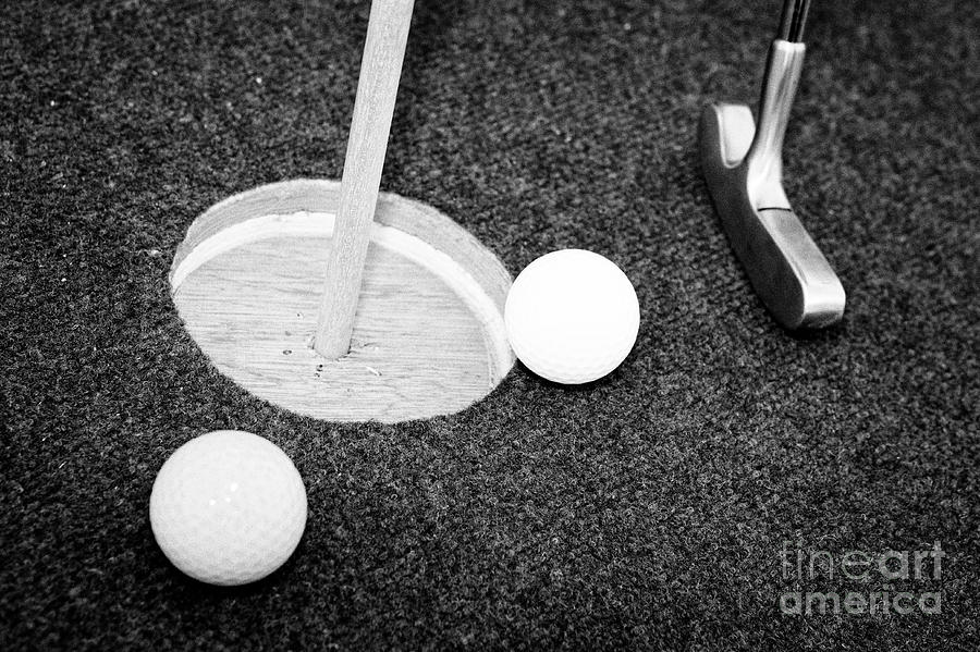 Golf Photograph - Balls And Golf Putter On Home Made Crazy Golf Hole by Joe Fox