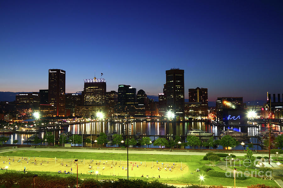 Baltimore Beach and Inner Harbor at Twilight Photograph by James Brunker