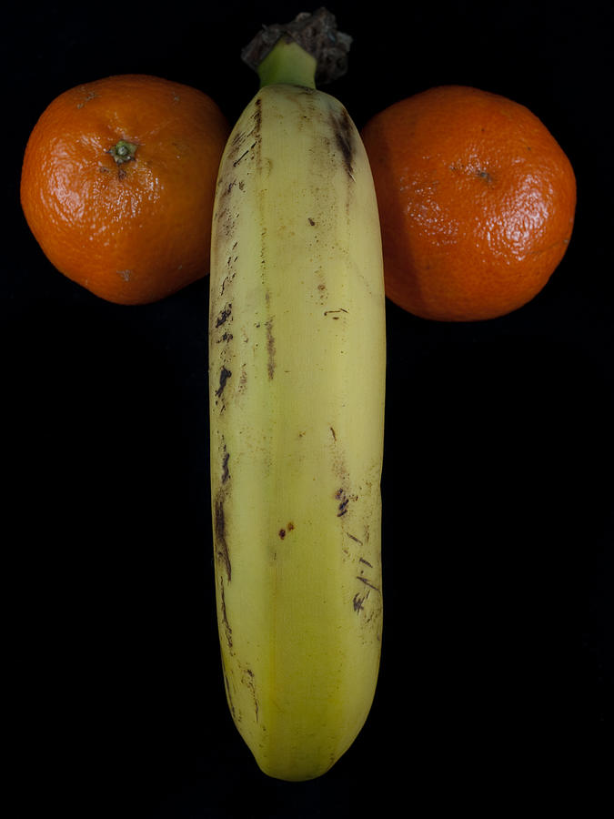 Banana With Oranges Photograph By Felix M Cobos