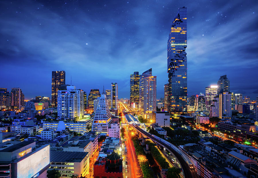 Bangkok city night view from Silom Business center Photograph by Anek Suwannaphoom
