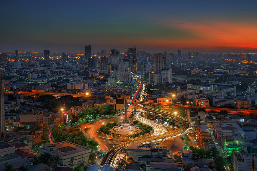 Architecture Photograph - Bangkok city night view with main traffic high way by Anek Suwannaphoom