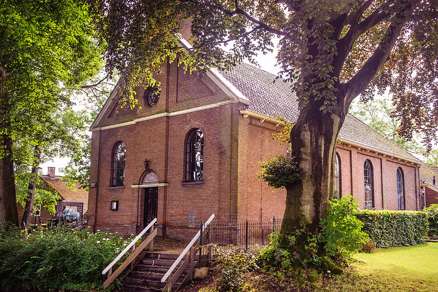 Baptist church in Giethoorn. Netherlands Photograph by Jenny Rainbow