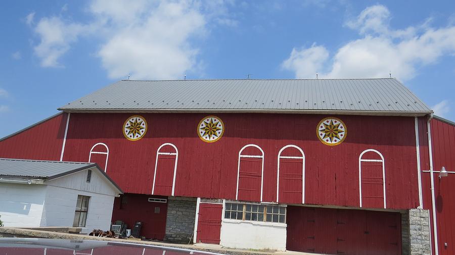 Barn Photograph - Barn with Hex Signs by Jeanette Oberholtzer