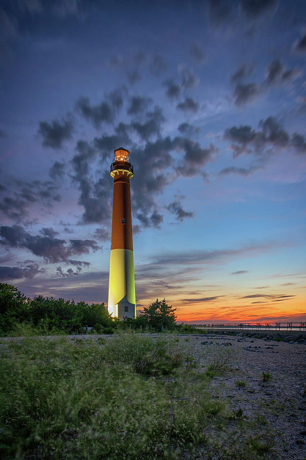 Sunset Photograph - Barnegat Lighthouse at Dusk by Rick Berk