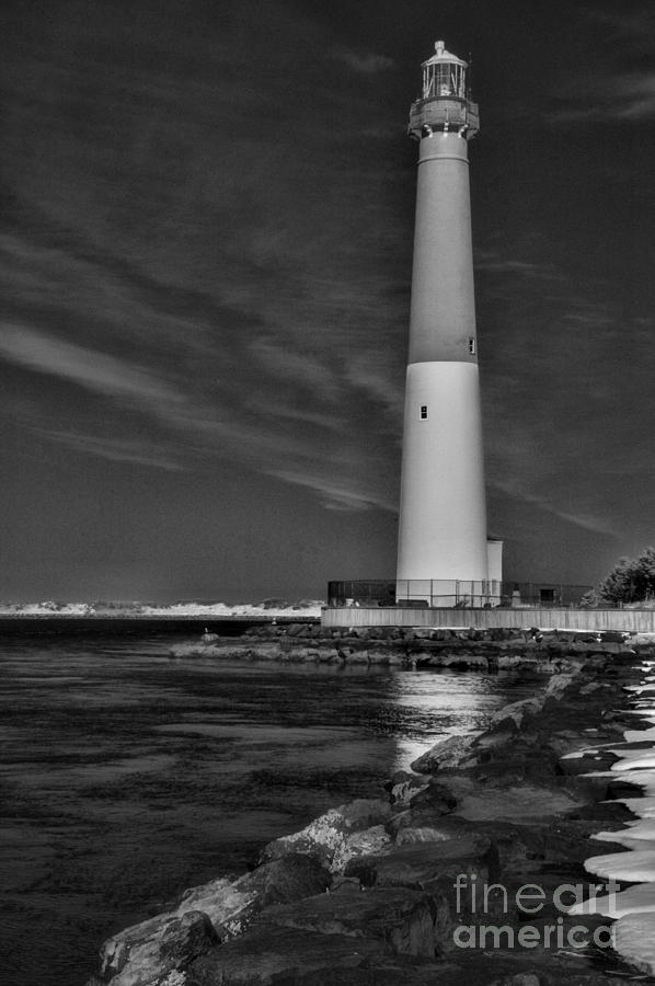 Barnegat Lighthouse in black and white Photograph by Paul Ward