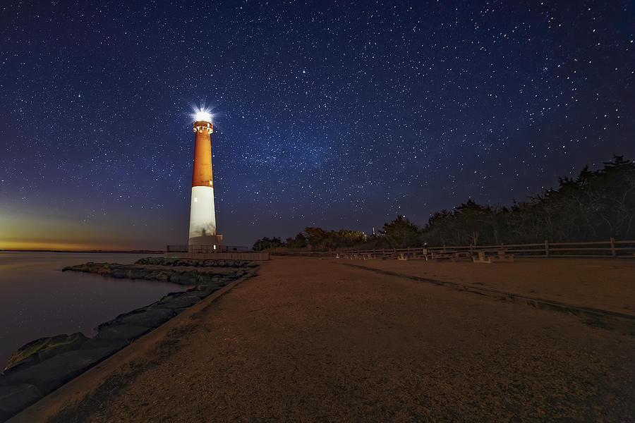 Barnegat Lighthouse Under The Stars Photograph by Susan Candelario