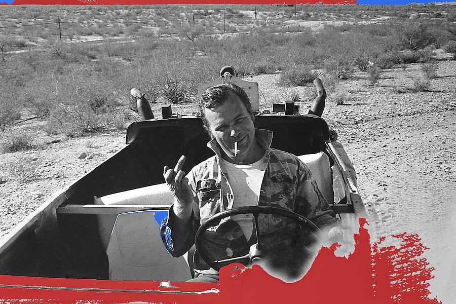 Barry Sadler  rudely gesturing in his 1941  German Army VW amphibian Tucson Arizona 1971 Photograph by David Lee Guss