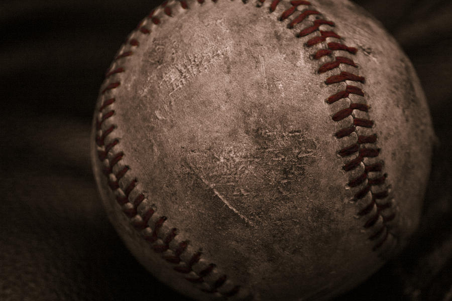 Baseball Cradled Photograph by Eugene Campbell