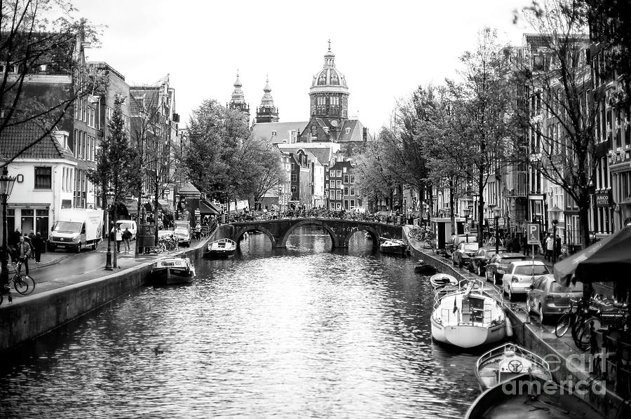 Amsterdam Basilica of Saint Nicholas in the Distance Photograph by John Rizzuto