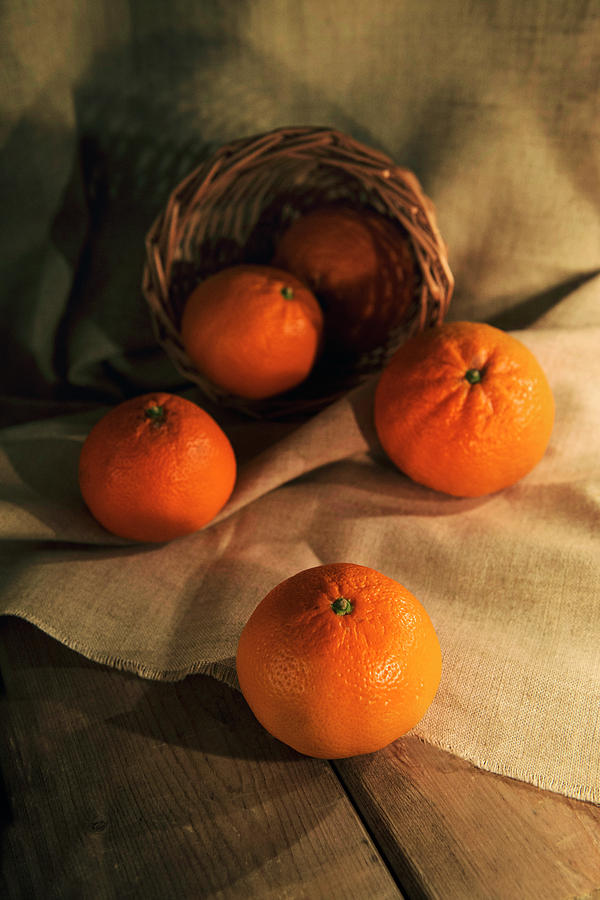 Basket of fresh tangerines Photograph by Jaroslaw Blaminsky