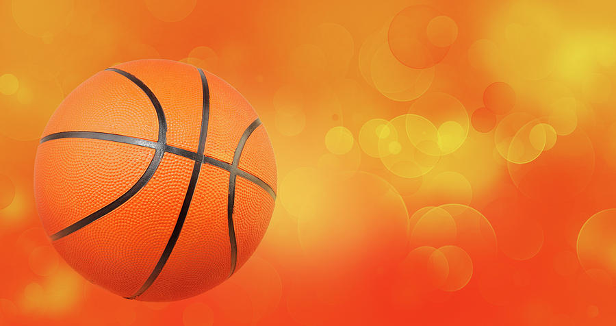 Basketball on abstract background  Photograph by Les Cunliffe