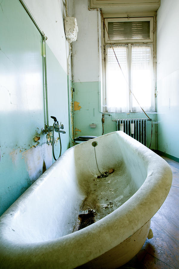 Bath tub tilt - abandoned building Photograph by Dirk Ercken