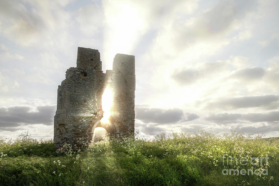 Bawsey church ruin with etherreal sunlight in Norfolk Photograph by Simon Bratt