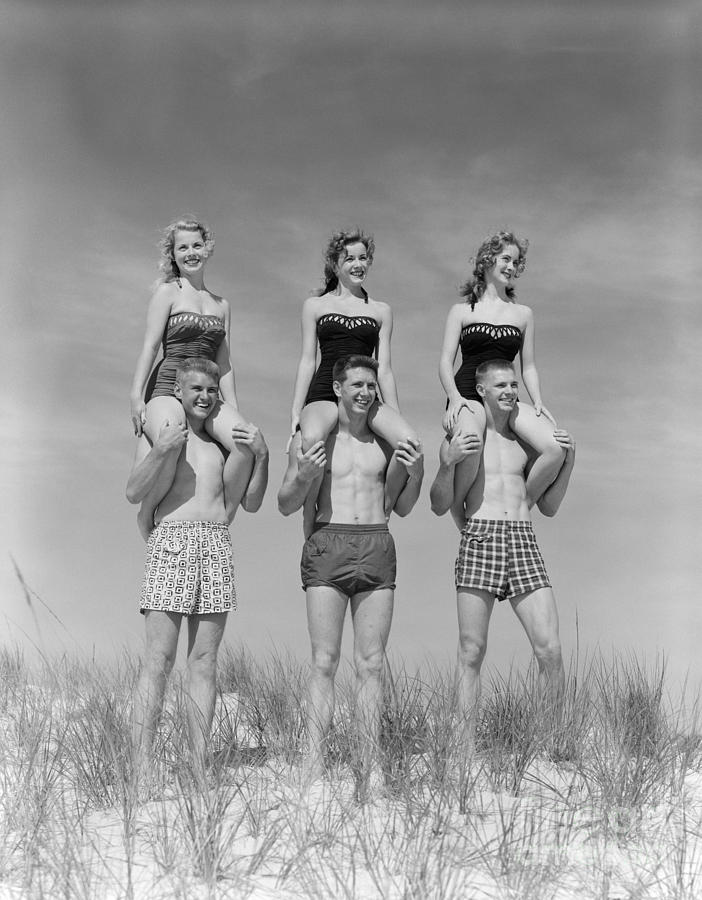 Beach Balancing Act, 1950s-60s Photograph by H Armstrong Roberts and ClassicStock