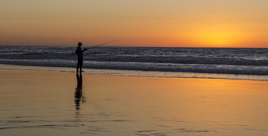 Beach Fishing at Sunset Photograph by Ed Clark