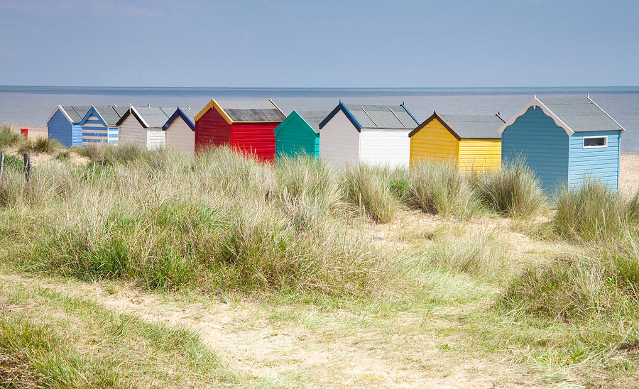 Beach huts Photograph by Ian Merton