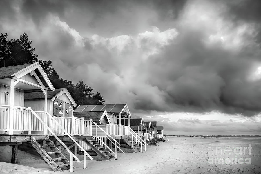 Norfolk beach huts in black and white England Photograph by Simon Bratt