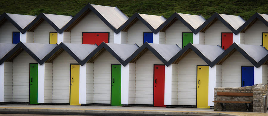 Beach Huts with Bench Photograph by Shirley Mitchell