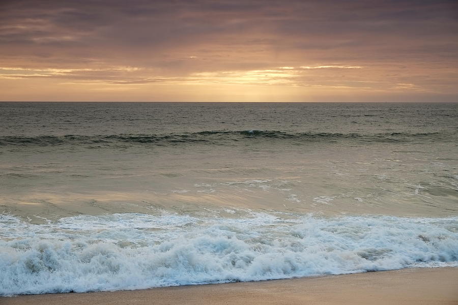 Beach waves after sunset Photograph by Angelo DeVal
