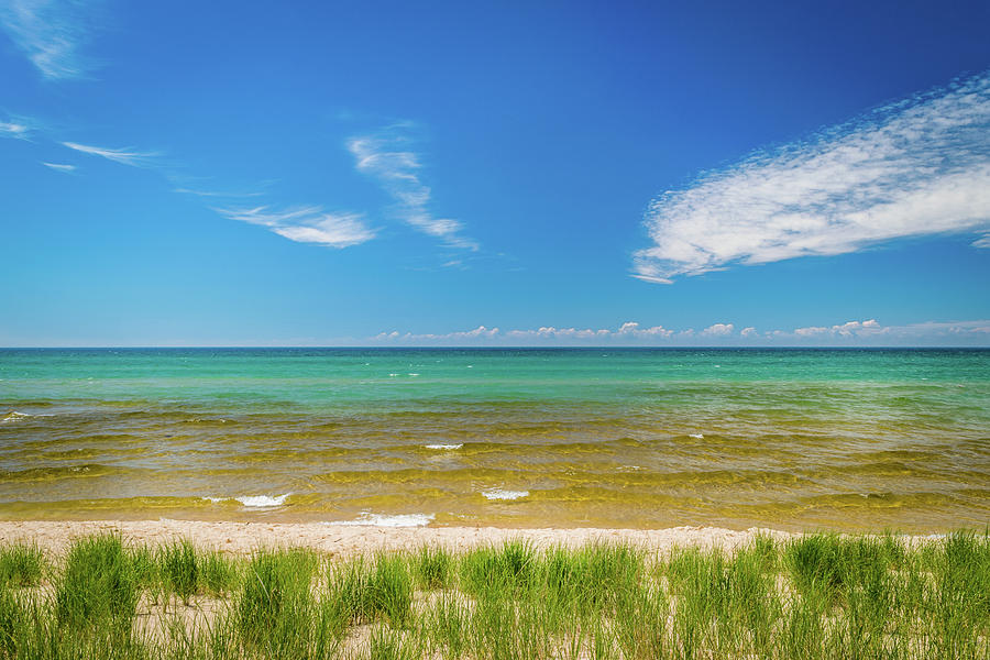 Beach With Blue Skies and cloud Photograph by Lester Plank