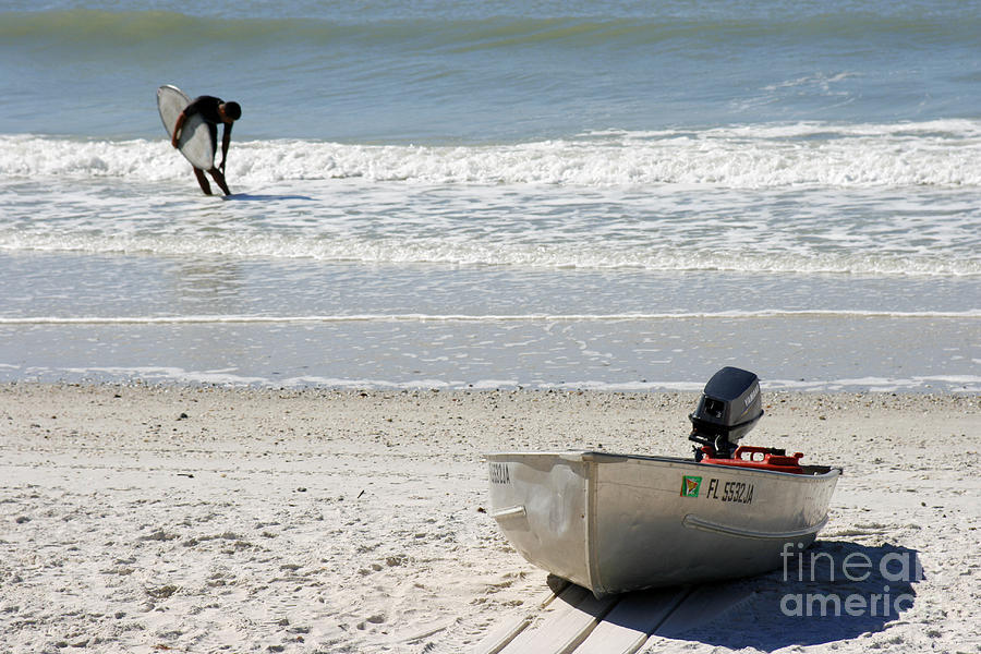 Beached Boat and Bodyboarder in Naples Florida Photograph by William Kuta