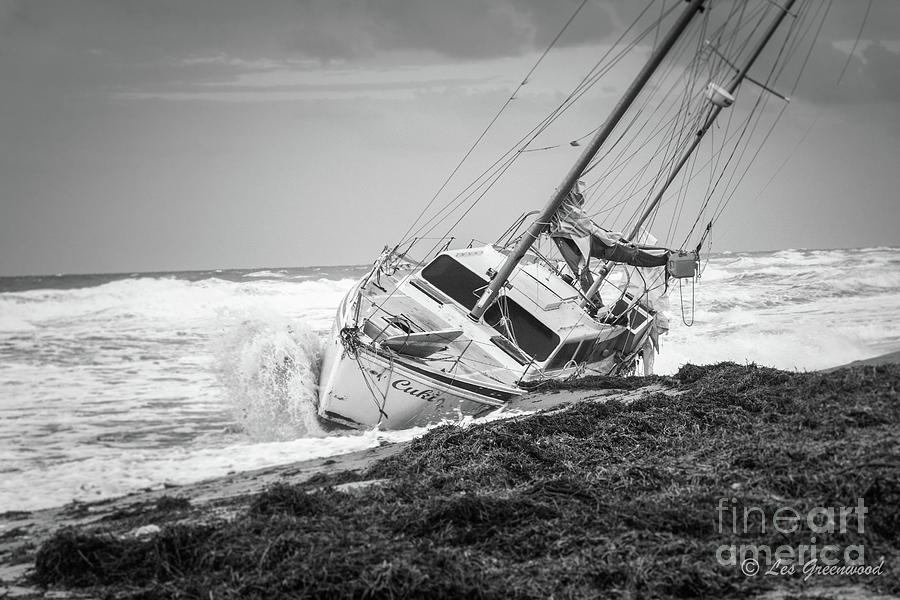 Beached boat Photograph by Les Greenwood