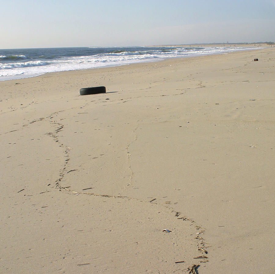 beached tire, Sandy Hook, New Jersey - 2003 Photograph by Robert Hopkins