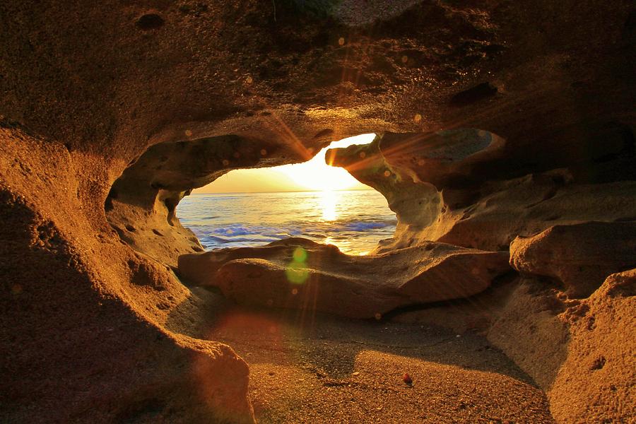 Beaming through the Rock Cave Photograph by Catie Canetti