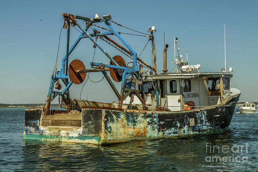 Beat up fishing boat Photograph by Claudia M Photography