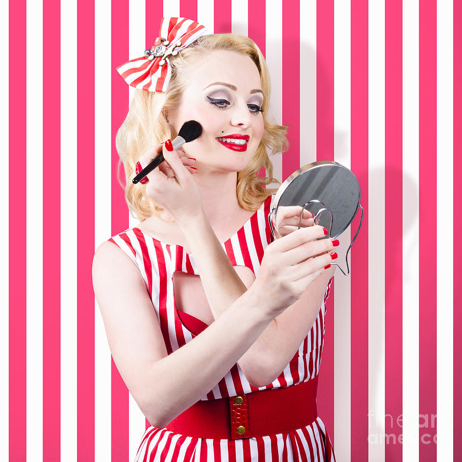 Beautiful cosmetic woman applying make-up base Photograph by Jorgo Photography