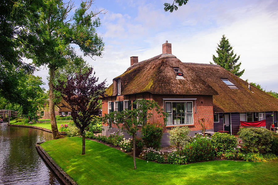 Beautiful Cottage at Canal in Giethoorn Photograph by Jenny Rainbow
