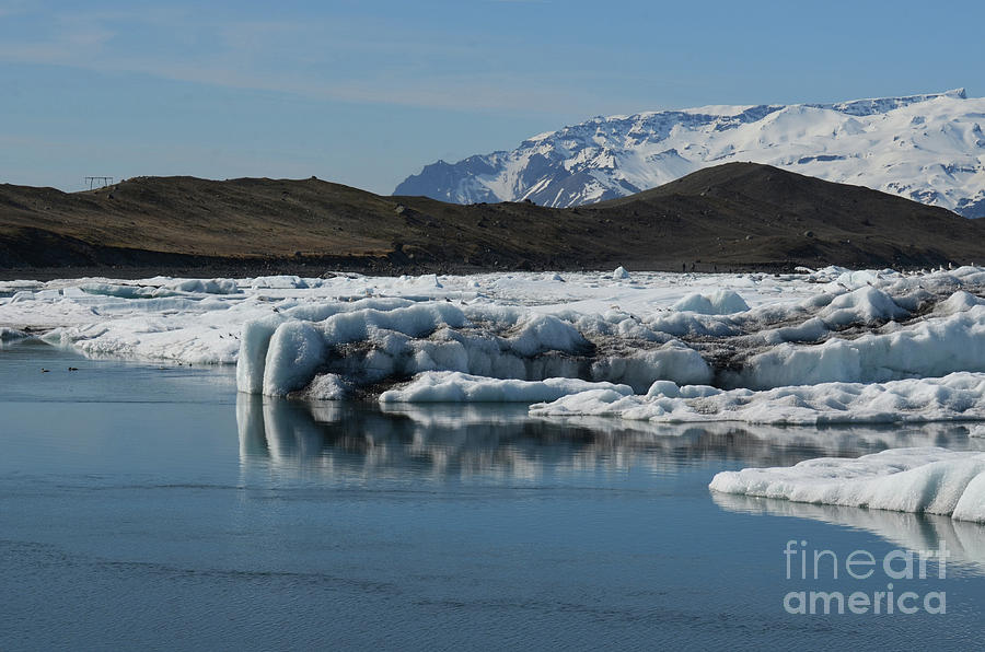 Beautiful landscape of glaciers and black sand  Photograph by DejaVu Designs