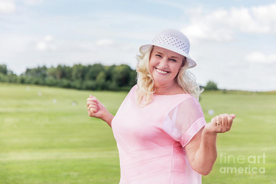 Beautiful mature woman portrait. Photograph by Michal Bednarek