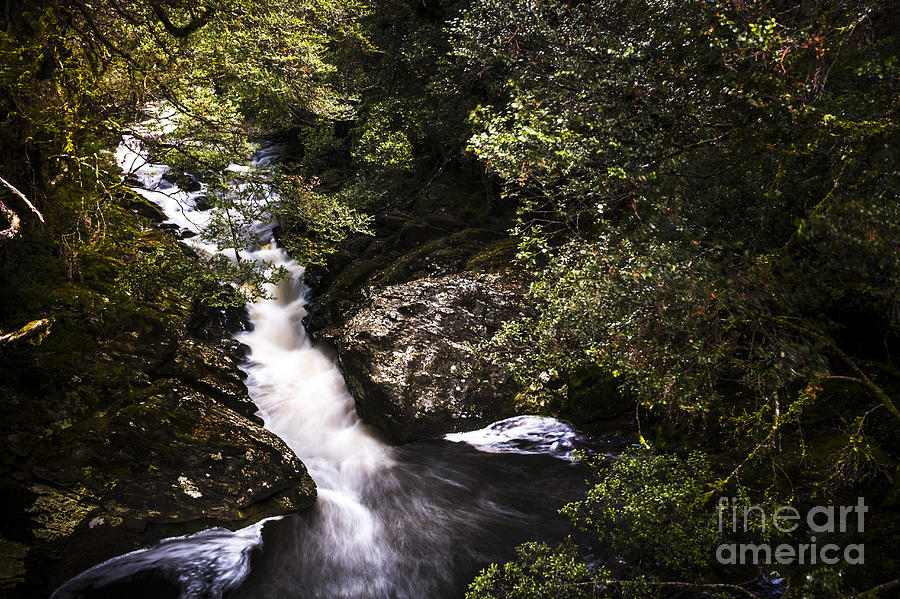 Beautiful nature landscape of a flowing waterfall Photograph by Jorgo Photography