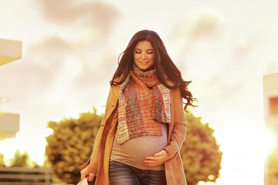 Beautiful pregnant woman with shopping bags Photograph by Anna Om