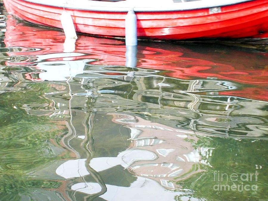 Beautiful Reflection Of Water Against A Boat Photograph by Vintage Collectables