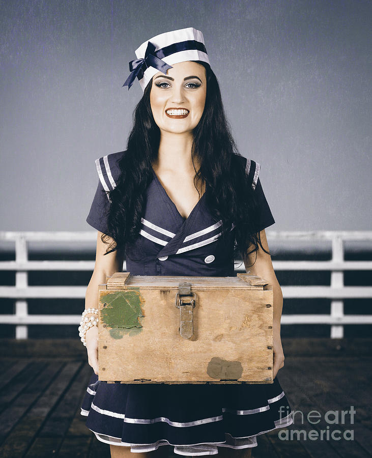 Beautiful sailor girl holding military ammo box Photograph by Jorgo Photography