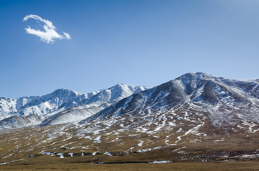 Beautiful snowy Tibetan high mountain landscape with the lonely ...