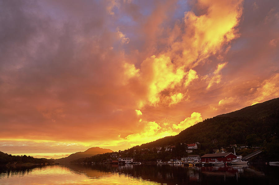 Beautiful Sunset At The Norwegian Harbour With The Vessels In P