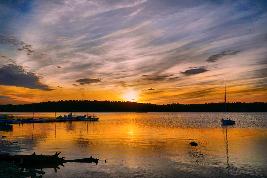 Beautiful sunset over lake Photograph by Lilia S