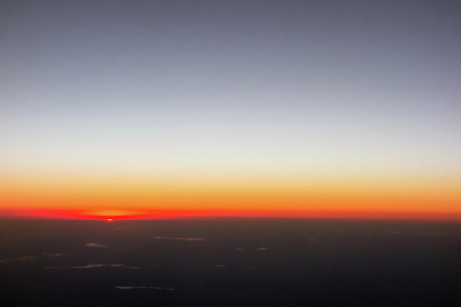 Beautiful Sunset View From An Airplane Over Land Photograph by Alex Grichenko