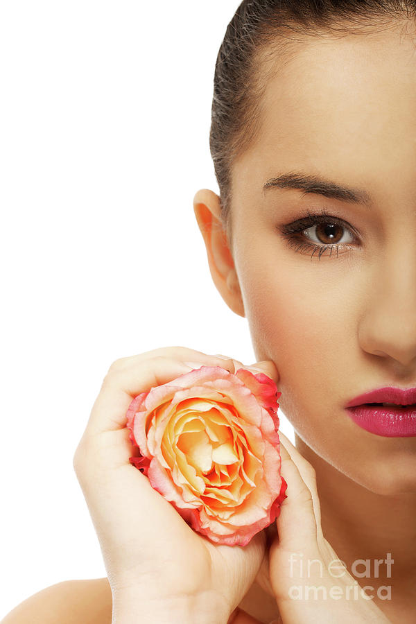 Beautiful woman with pink rose. Photograph by Piotr Marcinski - Pixels