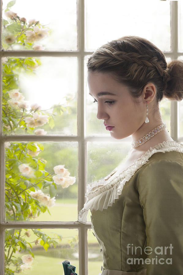 Beautiful Young Victorian Woman In Thought By The Window Photograph by Lee Avison