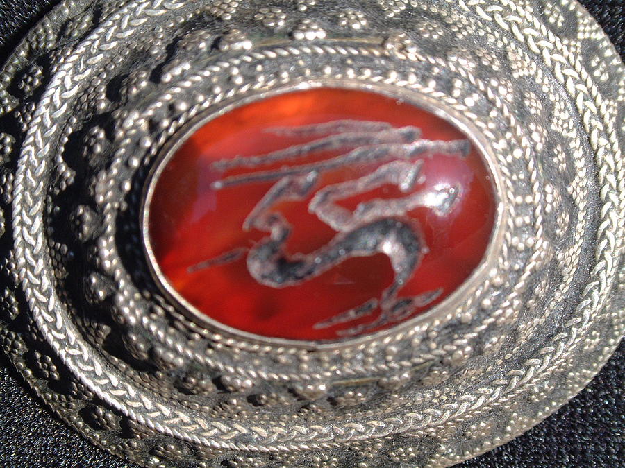 Dragon Jewelry - Bedouin silver pendant with inset carnelian stone decorated with an intaglio gazelle by Anonymous Bedouin silversmith
