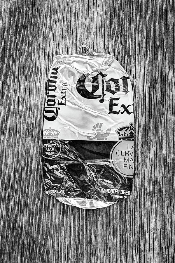 Beer Can Extra Blue Crushed on Plywood 81 in BW Photograph by YoPedro