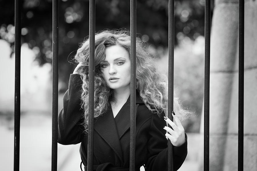 Behind bars, Paris Photograph by Jean Gill