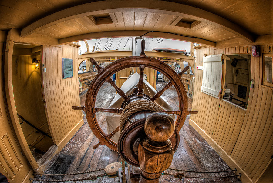 Behind the Helm Photograph by Fred LeBlanc