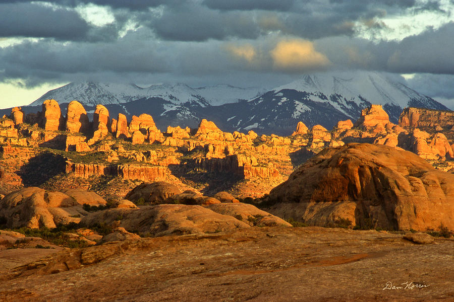 Behind The Rocks and La Sal Mountains Photograph by Dan Norris