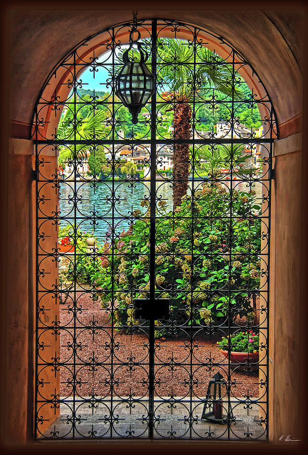 Behind the Wrought-Iron Door Photograph by Hanny Heim